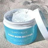Surf Bum butter on sand with top off