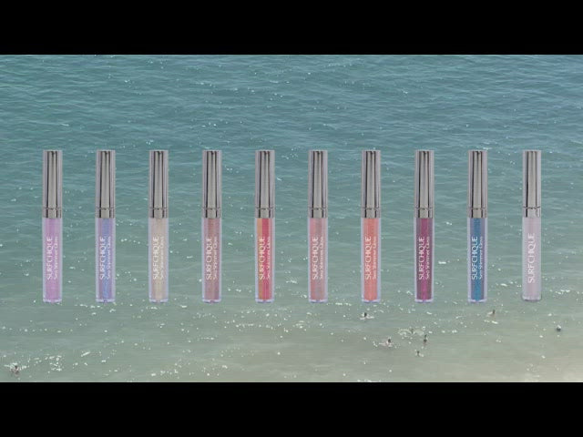 SURFCHIQUE Sea Shimmer Pearl Lip Gloss on shimmering sea